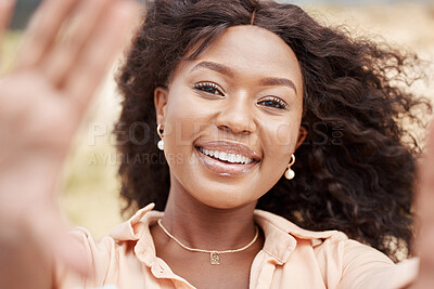 Buy stock photo Selfie, face and frame with a black woman taking a photograph outside during a bright summer day. Portrait, beauty and smile with an attractive African American female posing for a picture outdoor
