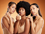 Beauty, diversity and makeup with a model woman friends in studio on a brown background to promote a product. Cosmetics, skincare and portrait of a female group posing for marketing or advertising