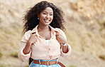 Black woman, smile and travel in nature on road trip, vacation or holiday in summer. Girl, happy and backpack with beauty, happiness and fashion in sunshine to relax, safari and rest in countryside
