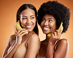 Model, women and smile with banana for phone for beauty, wellness and comic time against studio backdrop. Black woman, fruit and funny together for health, skincare and happy with playing phone call