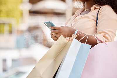 Buy stock photo Shopping bag, sale and smartphone with black woman, luxury boutique for customer and online purchase in city. African American female, phone and clothes from retail therapy spree for town market trip