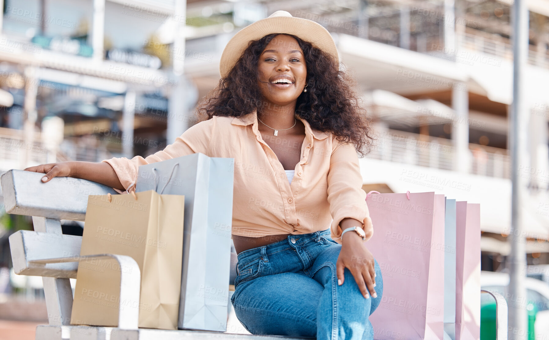 Buy stock photo Black woman, retail shopping bag and outdoor bench break from travel buying, sales and summer market retail fashion promotions in San Francisco California. Happy portrait of wealthy customer spending