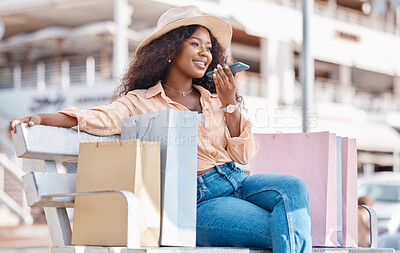 Buy stock photo Shopping, fashion and phone call, a black woman with a smile resting outside a mall. Relax on bench, happy customer after discount sale at shopping mall or designer boutique and talking on smartphone