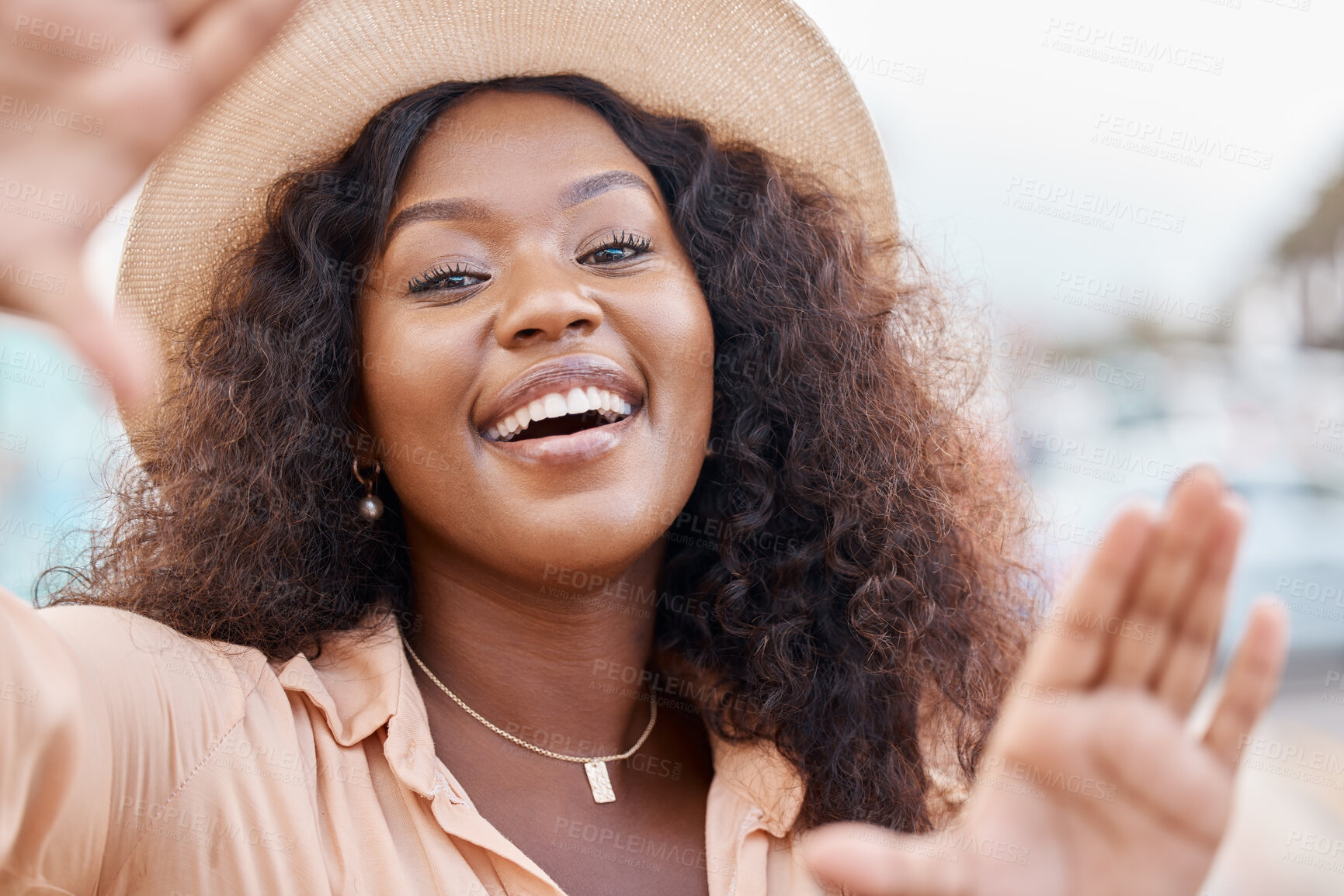 Buy stock photo Black woman, portrait smile and travel hands for picture perfect day on summer vacation in the outdoors. Face of happy African female traveler smiling with hand frame for capture or photography