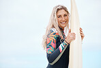 Surfing, beach and surfer woman at beach to surf, travel and body boarding adventure on holiday while happy on summer trip. Portrait of a female with surfboard and smile on Australia mockup holiday
