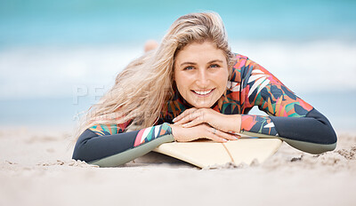 Surf, sports and beach portrait of woman relax on sand before ocean sea fitness, training exercise or wellness workout. Happy, smile and surfer girl ready for waves surfing freedom or water adventure