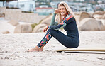 Happy women, relax and surfer on beach sand for happiness, calm and peace on summer vacation or holiday travel. Mature female, full body wetsuit and surfboard chill by ocean after surf training