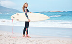 Woman, surfer and board by the ocean waves for sports exercise, hobby and swim in the summer outdoors. Portrait of a professional female standing on a beach in sport ready for surfing in South Africa