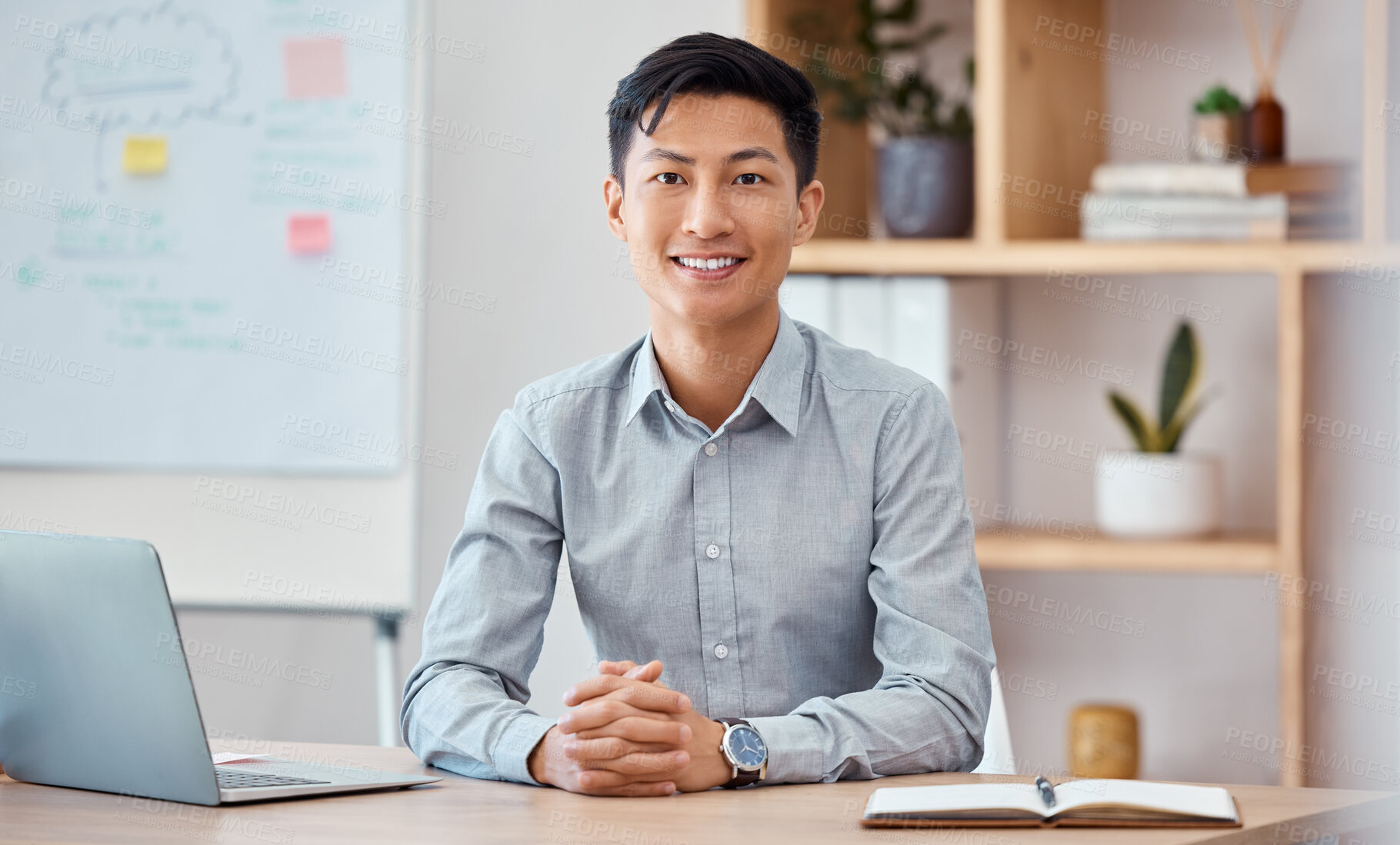 Buy stock photo Asian businessman, portrait and desk in startup agency working, consulting and planning as marketing consultant, strategy expert and data analysis researcher. Happy young Japanese employee in office