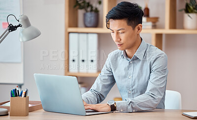 Buy stock photo Asian, man and laptop in office for email, communication and business on internet at desk. Computer, typing and work in corporate for digital marketing, advertising or seo job while writing in Tokyo