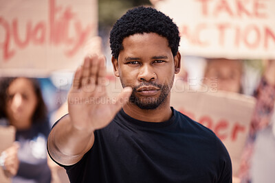Buy stock photo Protest, hand and stop with a black man in a demonstration or rally for human rights and equality. Justice, freedom and politics with a male activist ready to fight racism, violence or discrimination