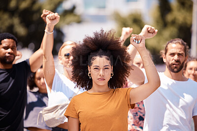 Buy stock photo People protest for freedom, support fist for climate change or black power empowerment in Los Angeles. Young woman, community rally together to fight for future human rights or global revolution