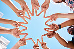 Friends, hands and star sign by volunteer group in support of environment cleaning project in summer blue sky from below. Peace, collaboration and teamwork by happy people gathering to help community