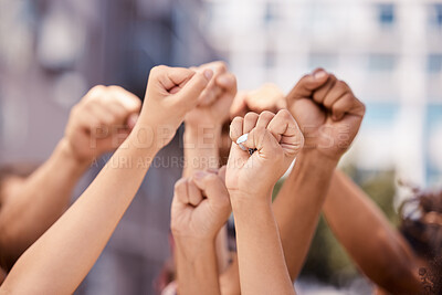 Buy stock photo Diversity, hands and fist in community protest for human rights, racism and equality in fight for justice in the city. Group hand of people in strike for economic or government change in a urban town