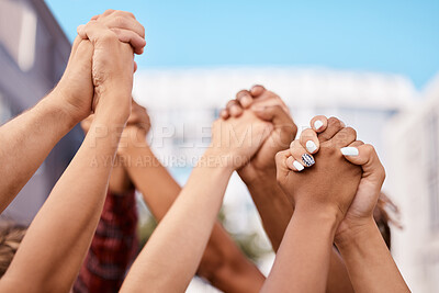 Buy stock photo Diversity, community collaboration and holding hands in air strong together or racial empowerment march. Peace protest, multiracial teamwork and activism friendship or union supporting human rights