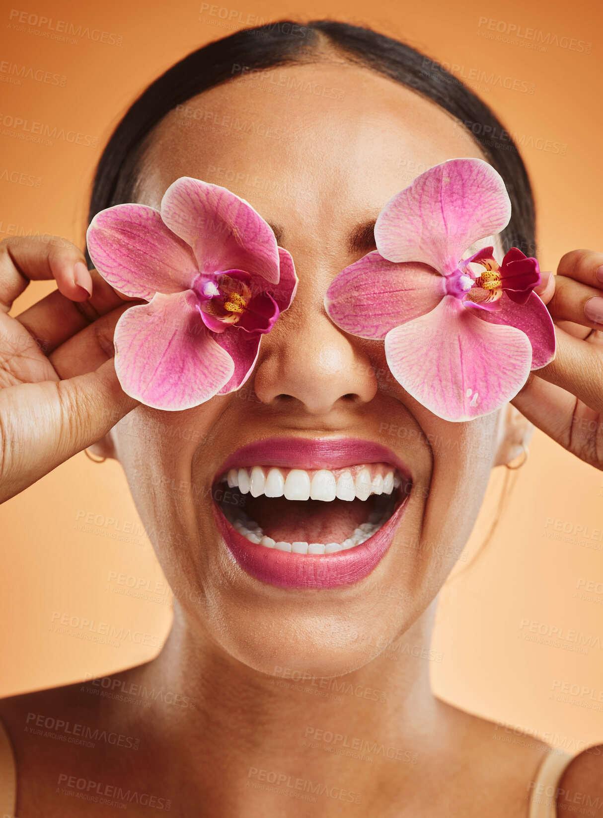 Buy stock photo Skincare, beauty and flowers on face of woman for spa wellness, health and beauty products. Creative, facial and happy girl with orchid over eyes for natural cosmetics, makeup and skincare products
