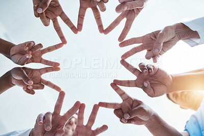 Buy stock photo Peace, team building and hands of business people with star shape using teamwork, support and global solidarity. Collaboration, below and group of workers in a huddle with our vision in a company