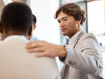 Depression, mental health and business people in a support group for therapy for a stressed African worker with anxiety. Sad, diversity and depressed employee in a company team meeting for counseling