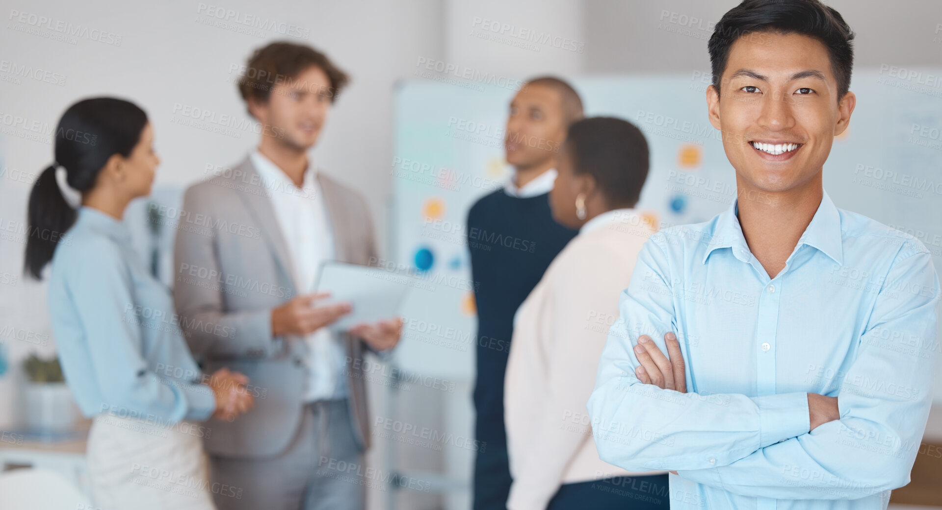 Buy stock photo Leadership, motivation or happy Asian businessman leader in meeting for diversity, teamwork or team building with smile. Happy employee, manager or worker with success, innovation or team building.