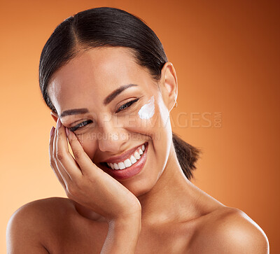 Buy stock photo Woman, beauty and smile for skincare moisturizer, lotion or creme for soft, gentle healthcare against a studio background. Happy satisfied female in care for healthy smooth skin or cosmetic treatment