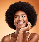 Beauty, black woman and happy wellness, aesthetic or natural makeup, glowing skincare and clean cosmetics on orange studio background. Smile young female model face, afro hair or thinking inspiration