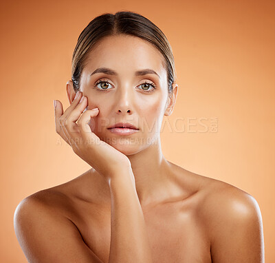 Buy stock photo Skincare, beauty and woman with makeup on face against an orange mockup studio background. Portrait of a young, healthy and cosmetic girl model with peace and calm from dermatology skin wellness