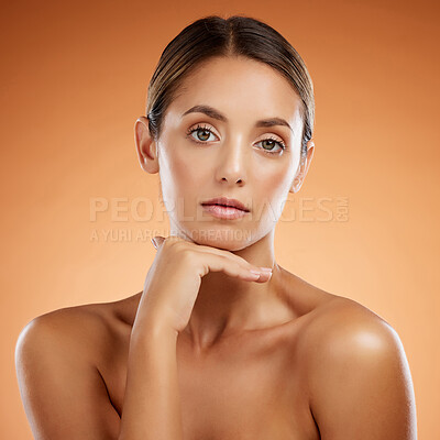 Buy stock photo Face, beauty skincare and portrait of woman isolated on an orange studio background. Makeup, model and female from Canada with glowing skin, healthy skin or flawless skin after facial spa treatment.