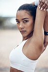 Fitness, workout and portrait of black woman stretching before marathon training or running in Jamaica. Health, wellness and sports, serious motivation to exercise for girl athlete or track runner.
