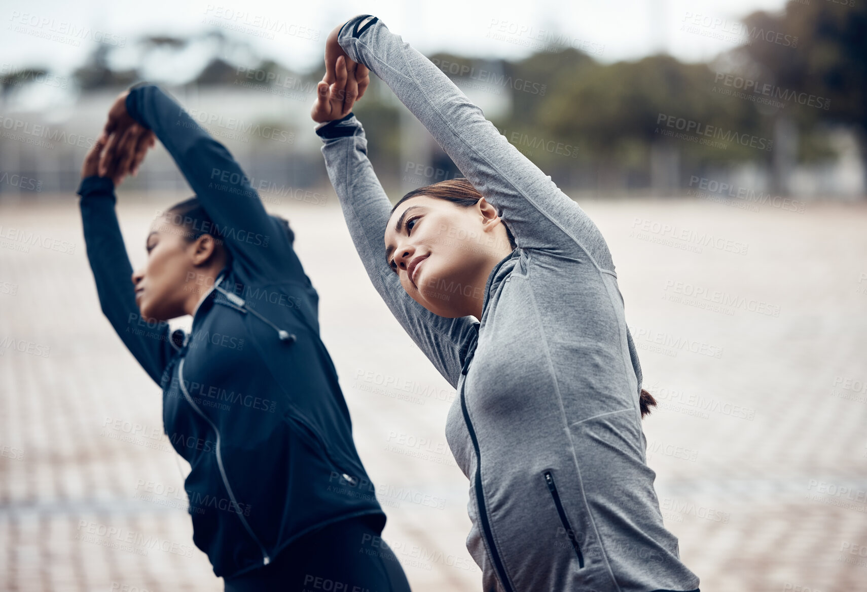 Buy stock photo Fitness friends, woman and stretching in the city for workout, exercise and training for health in the outdoors. Active women in morning routine stretch for cardio exercising in sports motivation