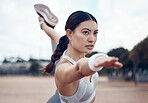 Fitness, woman and stretching in pose for exercise, workout and training for healthy lifestyle in the outdoors. Active female in sports stretch for health, wellness and cardio routine in a urban town