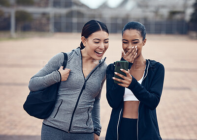 Buy stock photo Happy, phone and friends laughing at a funny online joke after a workout in a city together, cheerful, humour and carefree. Social media, internet and women sharing comedy meme or internet post 