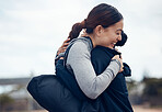 Women, hug or support in fitness success, workout goals or exercise target in the Indonesian city. Smile, happy or celebration embrace sports people, bonding friends or runners after winning marathon