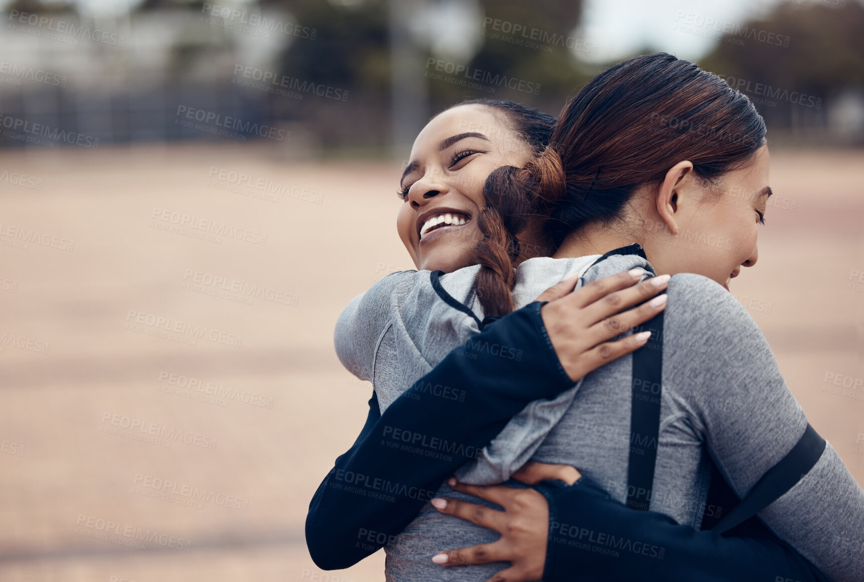 Buy stock photo Fitness, hugging and friends with a sports woman and female athlete embracing during an exercise or workout routine. Motivation, training and achievement with sporty people in celebration of a goal