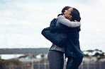 Women, friends and happy hug in city, street or outdoors, bonding and affection after a long time. Love, smile and lesbian couple, females or girls meeting in town, hugging or joyful embrace together