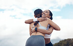 Fitness, success and friends hug in celebration of training, cardio exercise and running performance outdoors. Smile, sports and happy girl runners hugging with pride to celebrate workout progress