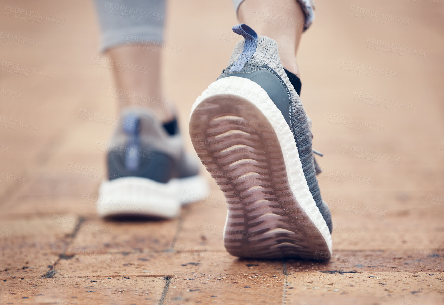 Buy stock photo Runner, shoes and outdoor walk of a woman feet before fitness, workout and running exercise. Sport training, foot walking and healthy cardio of a person on a brick pavement ready for a sports run