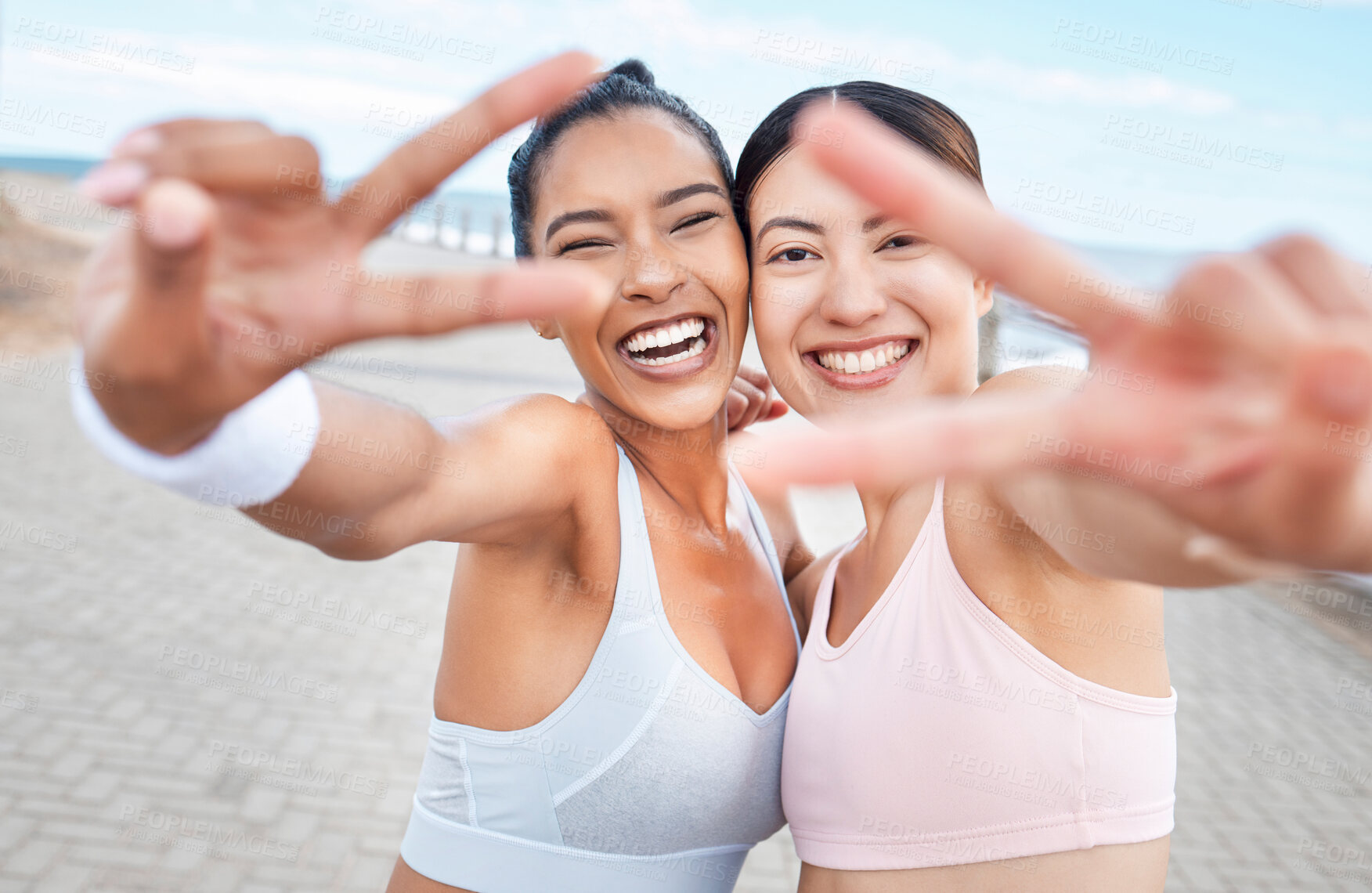 Buy stock photo Diversity, peace sign and women doing fitness, wellness and training outdoor together for exercise, warm up or happy. Female athlete, healthy girls or workout in sportswear for health, smile or relax