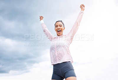 Buy stock photo Fitness, woman and runner in victory, win or achievement for sports exercise, workout or training in cloudy sky background. Happy active female runner celebrating, winning and success in the outdoors