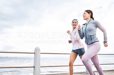 Buy stock photo Running, fitness and friends, women run by the beach, exercise and cardio, endurance and active lifestyle. Young, happy people, runner and health, body training motivation and workout outdoors.