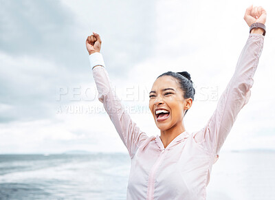 Buy stock photo Happy woman, beach fitness success and achievement, freedom and motivation goals, energy and wellness on clouds sky background. Excited sports female winner, fist arms up celebration and inspiration