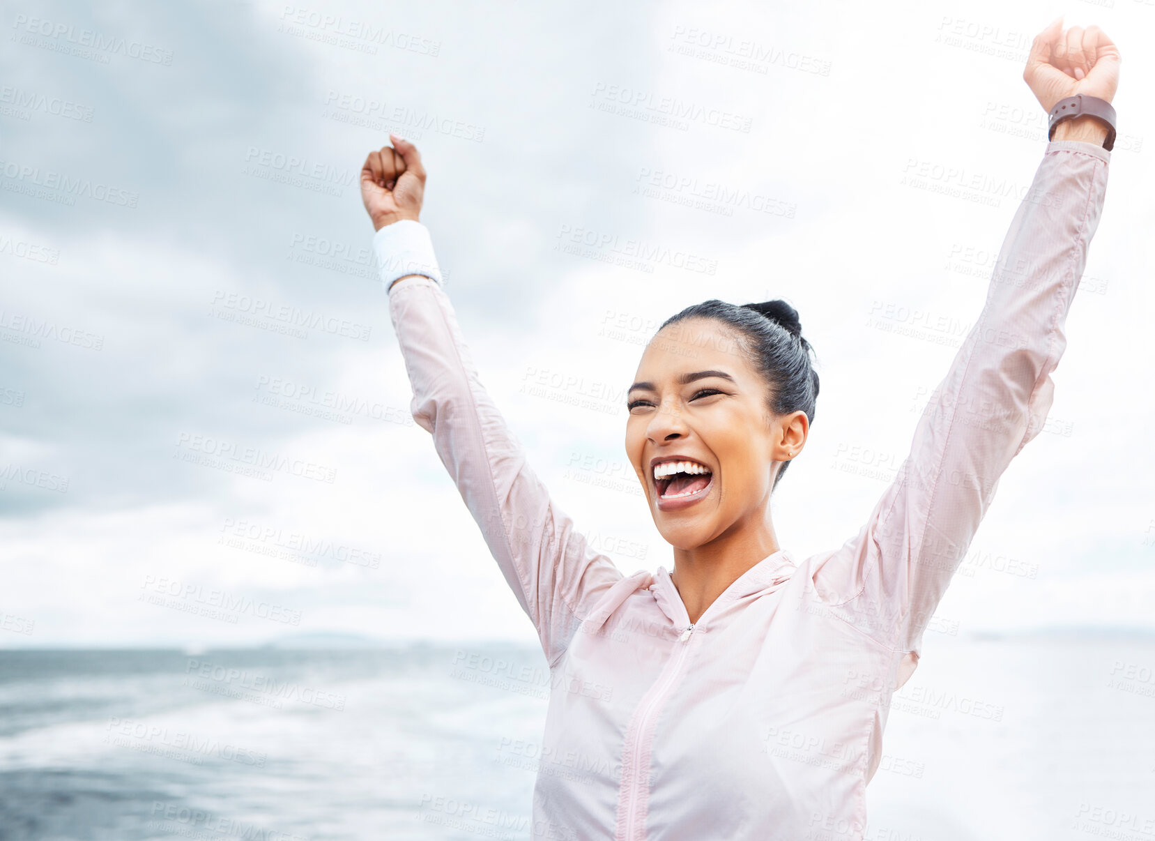 Buy stock photo Happy woman, beach fitness success and achievement, freedom and motivation goals, energy and wellness on clouds sky background. Excited sports female winner, fist arms up celebration and inspiration