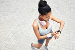 Exercise, runner and black woman with digital smartwatch to track steps, calories counter or heart rate. Sports health, running monitor and fitness app to check wellness, training and workout support