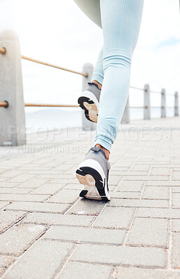 Buy stock photo Zoom of runner, sport woman for fitness legs running, training or exercise workout by the sea, beach or ocean. Wellness, health or runner girl with freedom, cardio or energy for marathon or race.