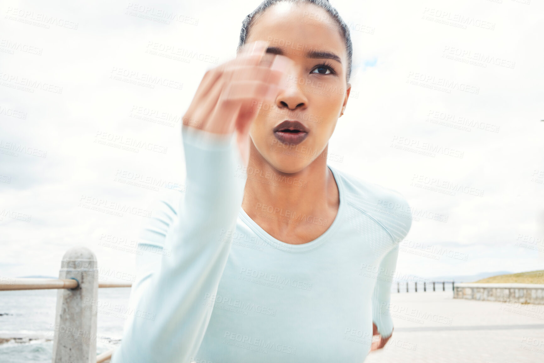 Buy stock photo Speed, focus and running black woman with outdoor motivation for competition training, goal or wellness lifestyle with sky mock up. Commitment of fast race or sports athlete workout exercise by ocean