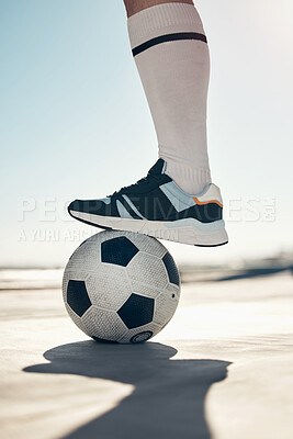 Buy stock photo Fitness, city soccer and foot on ball, friendly game in summer heat, man ready to score goals closeup. Football, motivation and healthy urban workout, fun with training, practice and a soccer ball.