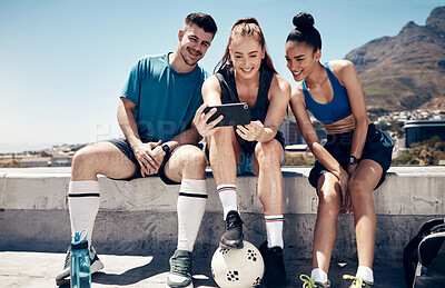 Buy stock photo Sports, social media and friends with phone and relax after football training, fitness and workout. Summer, internet and technology with athlete and soccer ball for exercise, health and wellness 