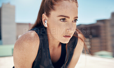 Buy stock photo Fitness face, thinking and focus woman city training, sports exercise or outdoor workout with music earphones. Female runner challenge, mental vision and mindset goals, breathe and running motivation