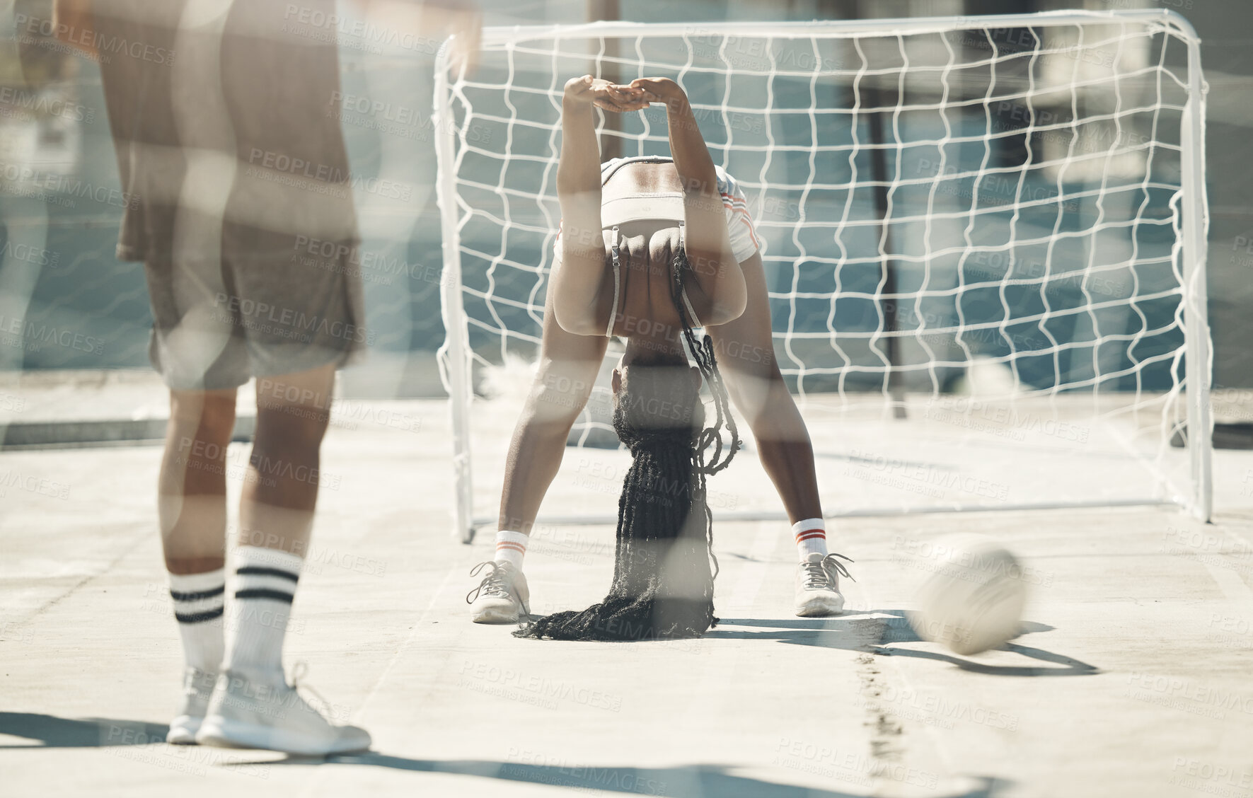 Buy stock photo Football, fitness or sports black woman stretching in city rooftop for sport exercise, training or workout. Training, health or soccer player girl in street for game, wellness or warm up in Brazil