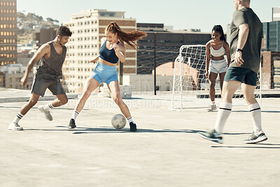 Buy stock photo Soccer, rooftop and friends happy activity bonding together with sport workout training in city. Diversity, sports and men and women, football competition exercise and healthy lifestyle motivation