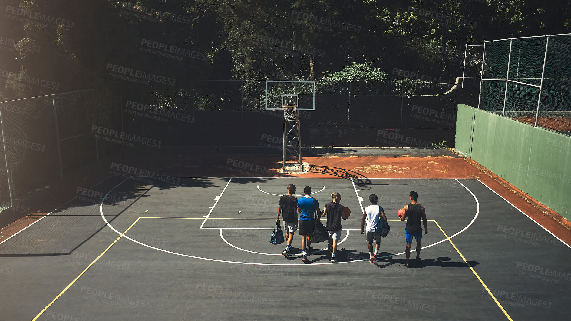 Buy stock photo Team, exercise and basketball for training, on court and workout for game and sportswear. Teamwork, sports and fitness athlete before match, relax and practice for health to play together outdoor.